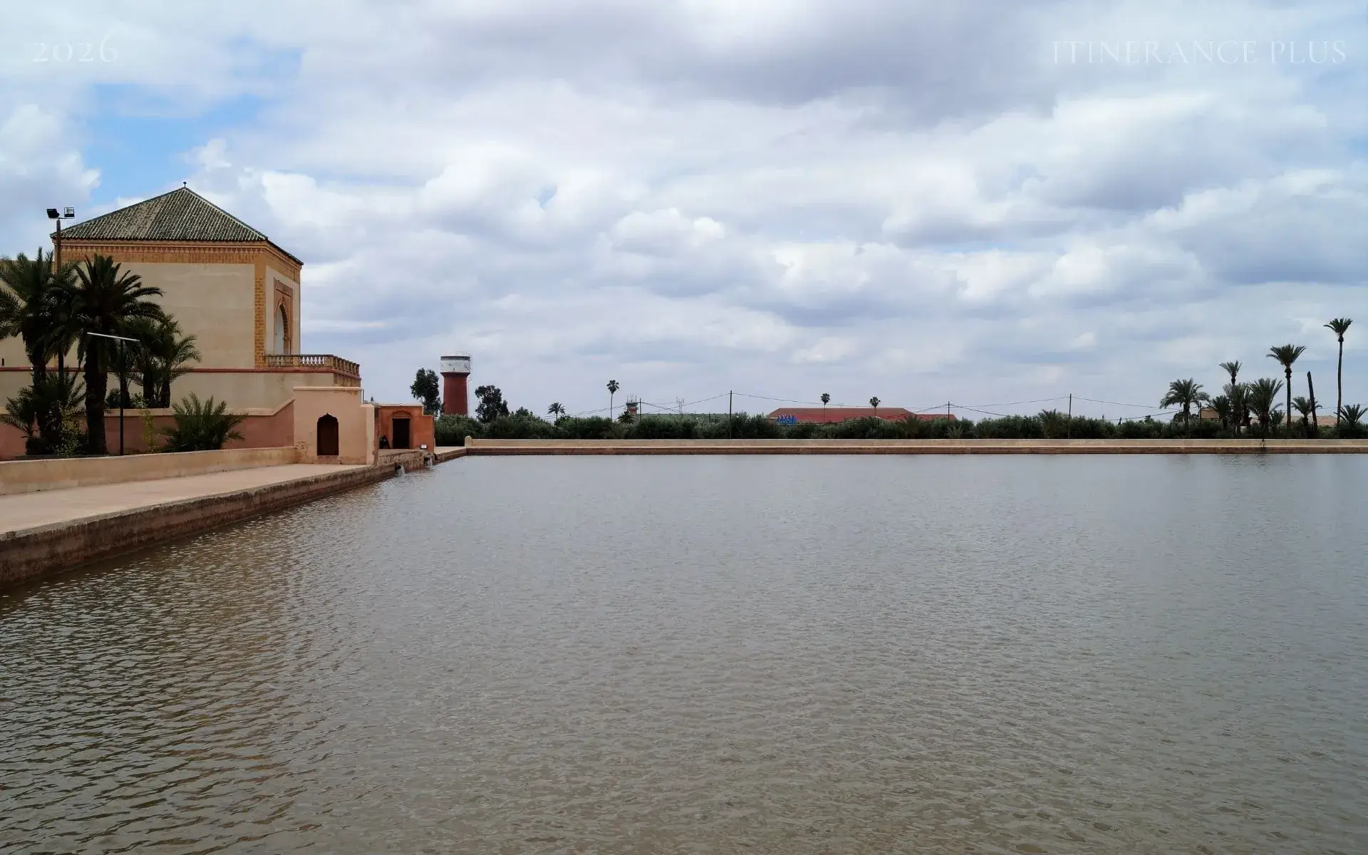 What secret hides the green-tiled pavilion of The Menara?