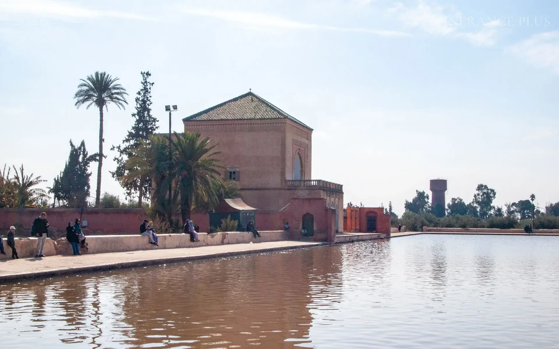 The Menara: a mirror of water facing the Atlas snows